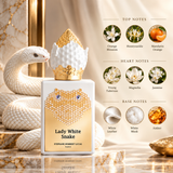 A perfume bottle labeled 'Lady White Snake' by Stephane Hembert Lucas Paris, styled with a white and gold snake and surrounded by scent note graphics on a marble surface.