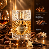 Angels' Share Kilian fragrance bottle in a warm amber-toned studio setting with whiskey glass, wood bark, chocolate, vanilla flowers, and scent notes text on the right.