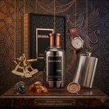 "A black perfume bottle labeled 'King' by Bharara, with a black cap and rectangular label, set against a dramatic dark background with wooden shelves, books, and warm golden lighting."