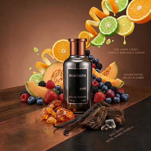 "A perfume bottle labeled 'King' by Bharara, styled with orange, bergamot, lemon, grapefruit, fruity notes, amber, vanilla, and other fragrance ingredients against a warm brown background with citrus fruits, berries, and spices."