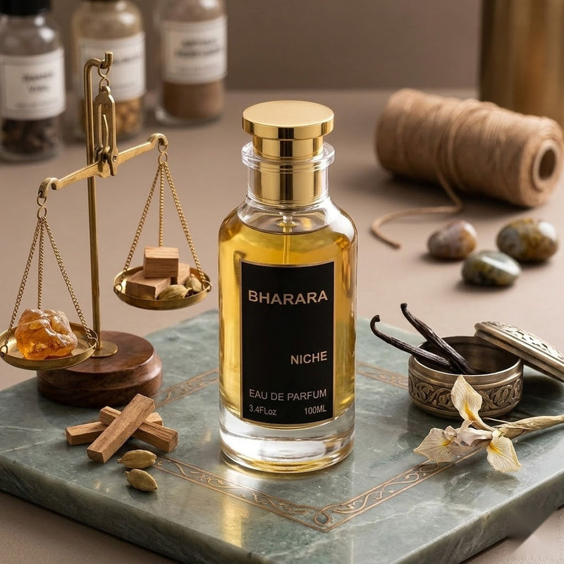 "Bharara Niche Parfum Spray 100ml perfume bottle displayed on a table with perfume accessories."