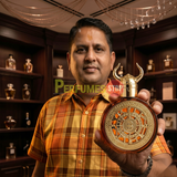 "Perfumes Stop owner holding a bottle of Bharara Viking Rio Parfum"