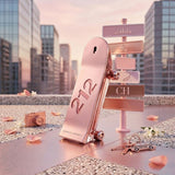 "Carolina Herrera 212 Heroes Forever Young EDP Spray 2.7oz / 80ml pink perfume bottle displayed in a stylish city setting."