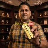 "Perfumes Stop owner holding a bottle of Carolina Herrera 212 VIP Are You on The List? NYC EDP Spray 2.7oz / 80ml."