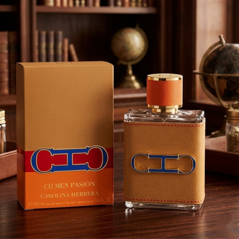 "Carolina Herrera CH HC HC CH MEN PASION EDP Spray 3.4oz / 100ml perfume bottle and matching orange and gold box displayed in an elegant setting."