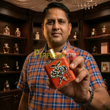 "Perfumes Stop owner holding a bottle of Carolina Herrera CH HC MEN HOT! HOT! HOT! Limited Edition EDP Spray 3.4oz / 100ml."