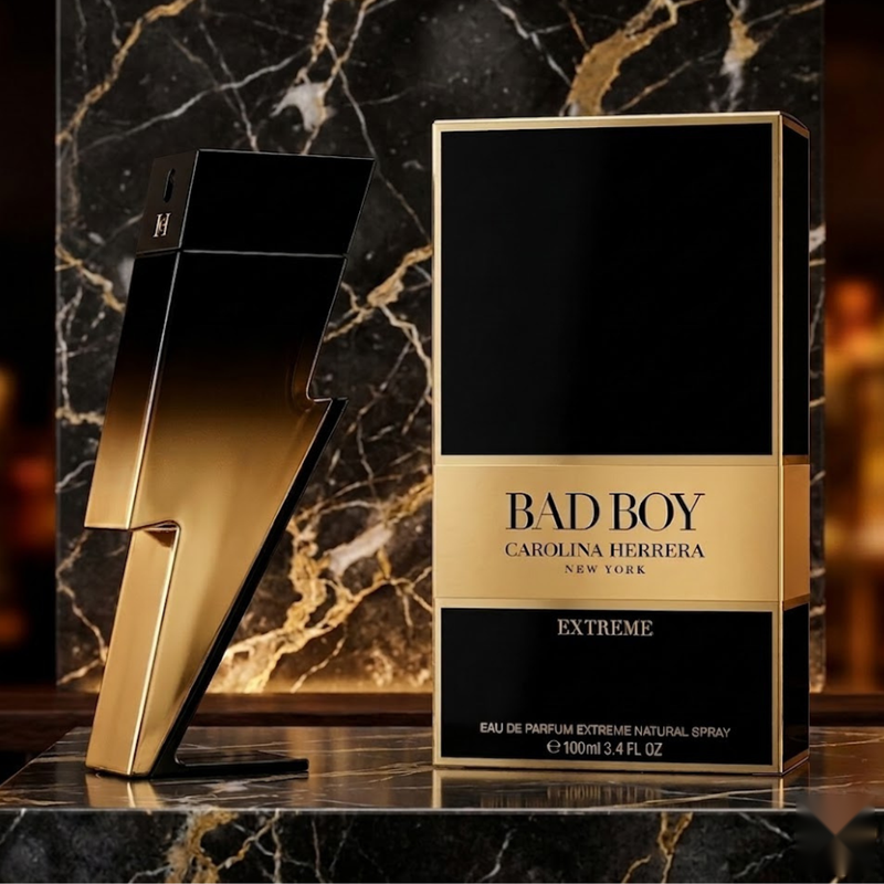 "Carolina Herrera New York Bad Boy Extreme EDP Extreme Spray 3.4oz perfume bottle and matching black and gold box."
