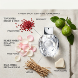 "Emporio Armani Diamonds EDP perfume bottle displayed with bergamot, pink pepper, rose petals and decorative fragrance ingredients."