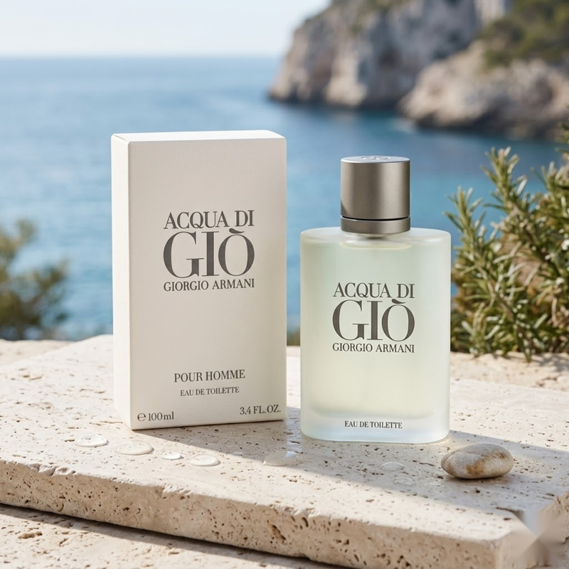 "Giorgio Armani Acqua di Gio EDT Spray 3.4oz / 100ml perfume bottle and matching white box displayed in a coastal setting."