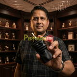 "Perfumes Stop owner holding a bottle of Jean Paul Gaultier Le Male Le Parfum EDP Intense Spray 4.2oz / 125ml."