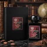 "A bottle of Lorenzo Pazzaglia Choco Raptor Extrait de Parfum with its matching black packaging box, set against a dark, elegant background with coffee beans, chocolate, and warm lighting."