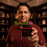 "Perfumes Stop owner holding a bottle of Lorenzo Pazzaglia Gasoleather Extrait de Parfum"