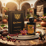 "A bottle of Lorenzo Pazzaglia Que Chimba Extrait de Parfum with its matching black packaging box, featuring a gold butterfly graphic and colorful label, set against a warm, elegant background with decorative arches and soft golden lighting."