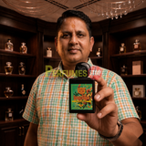 "Perfumes Stop owner holding a bottle of Lorenzo Pazzaglia Speechless Extrait de Parfum"