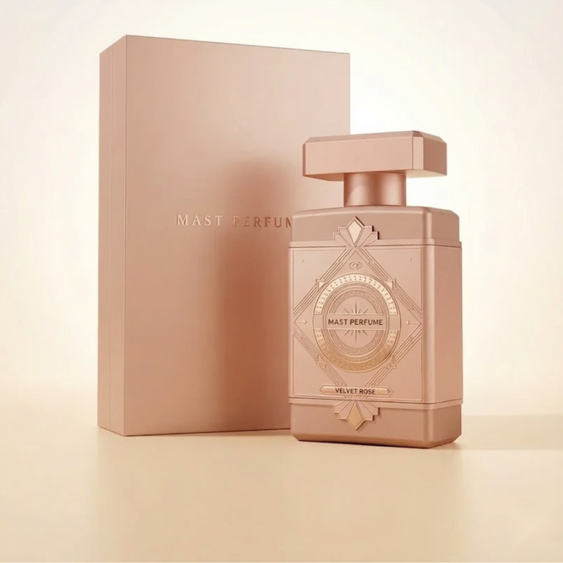 "Mast Parfume Velvet Rose perfume bottle displayed with a pink box and perfume accessories."
