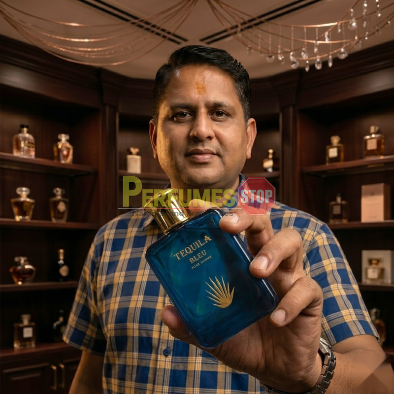 "Perfumes Stop owner holding a bottle of Tequila Bleu Pour Homme EDP Spray 3.3oz / 100ml."