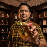 "Perfumes Stop owner holding a bottle of Tequila Gold Pour Homme EDP Spray 3.3oz / 100ml."