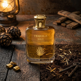 "Tequila Gold Pour Homme EDP Spray 3.3oz / 100ml amber perfume bottle displayed on a wooden table."