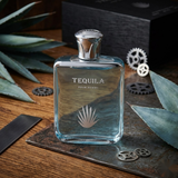 "Tequila Pour Homme EDP Spray 3.3oz / 100ml blue perfume bottle displayed with coffee beans."